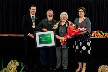 Christine and Gerry Bennett - Receiving Certificate of Recognition.