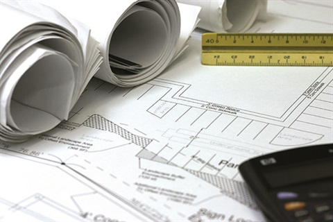 Planning Fees & Charges - House planning diagrams spread out. 