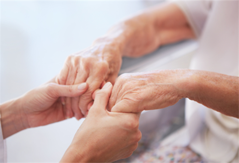 Community Wellbeing Committee - Younger and Older hands holding.