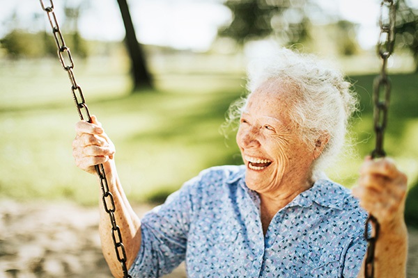 Bringing-Awareness-to-Dementia-Elderly-woman-on-swing.jpg