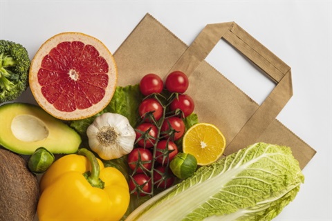 Food Waste Minimisation - vegetables on a paper bag.