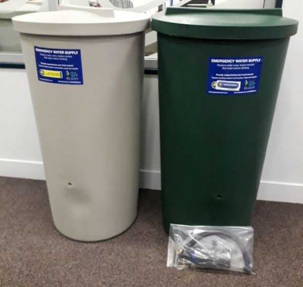 Emergency rainwater 200 litre tanks in heritage green and birch grey.